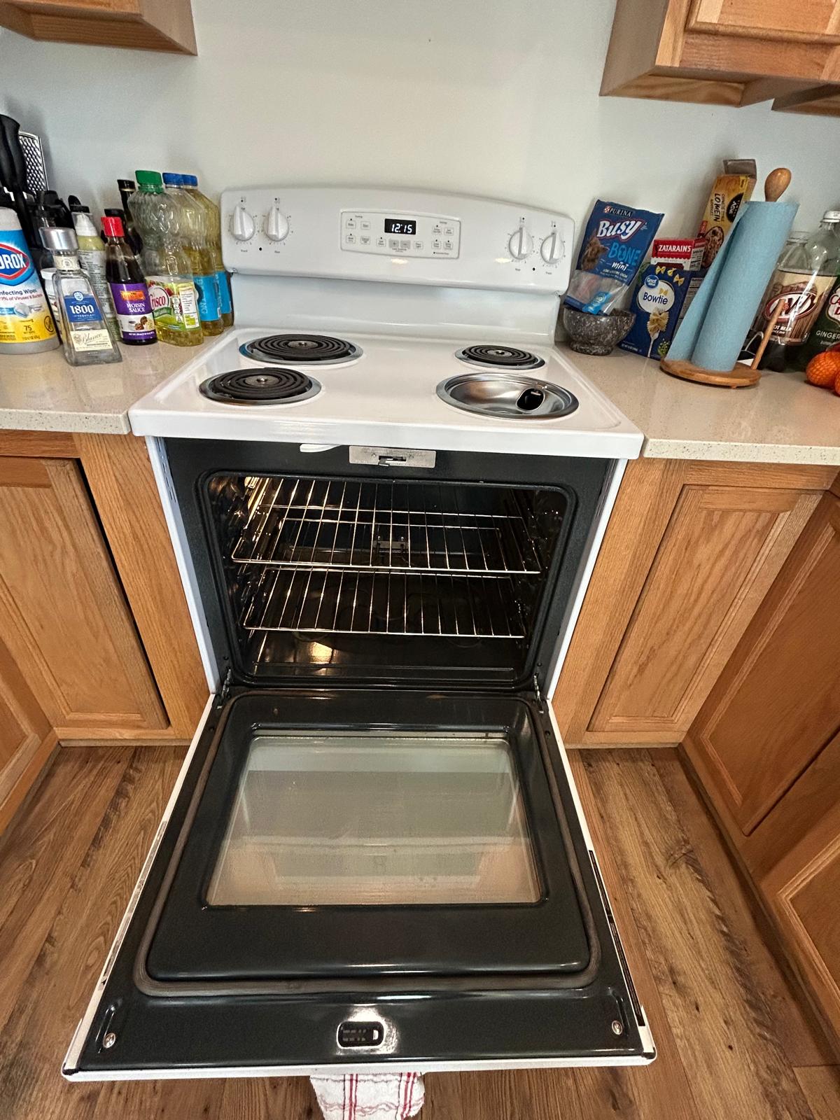 Spotless oven interior after professional deep cleaning
