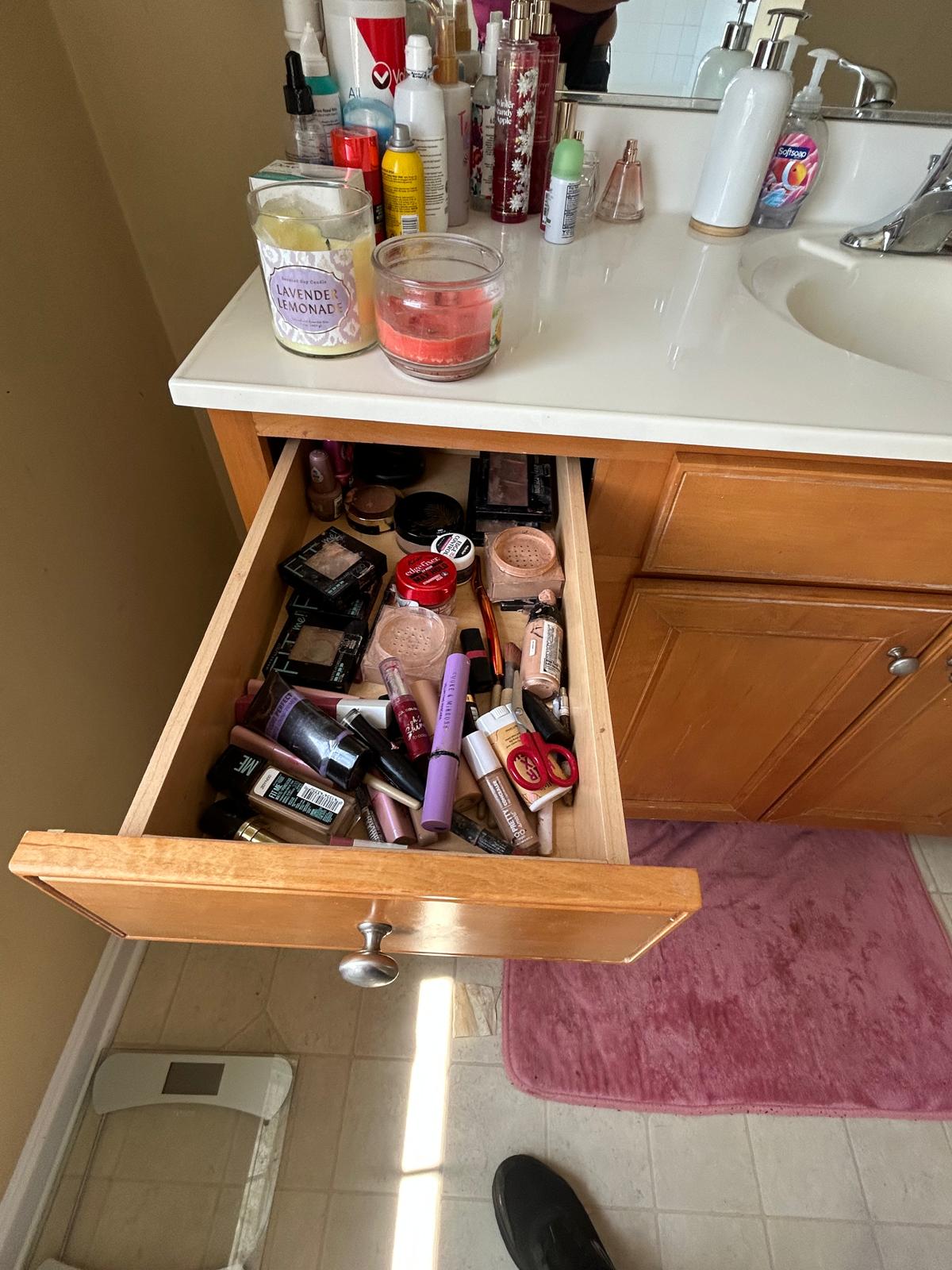 Organized, clean vanity drawer after detail cleaning
