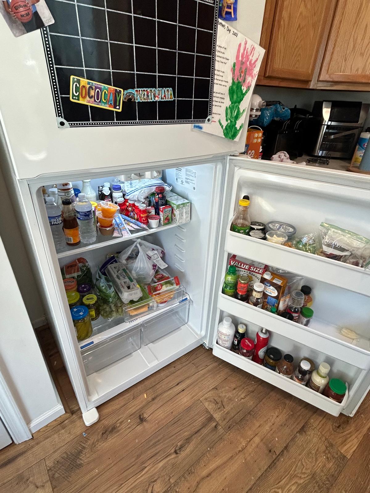 Interior refrigerator cleaning with sanitized shelves